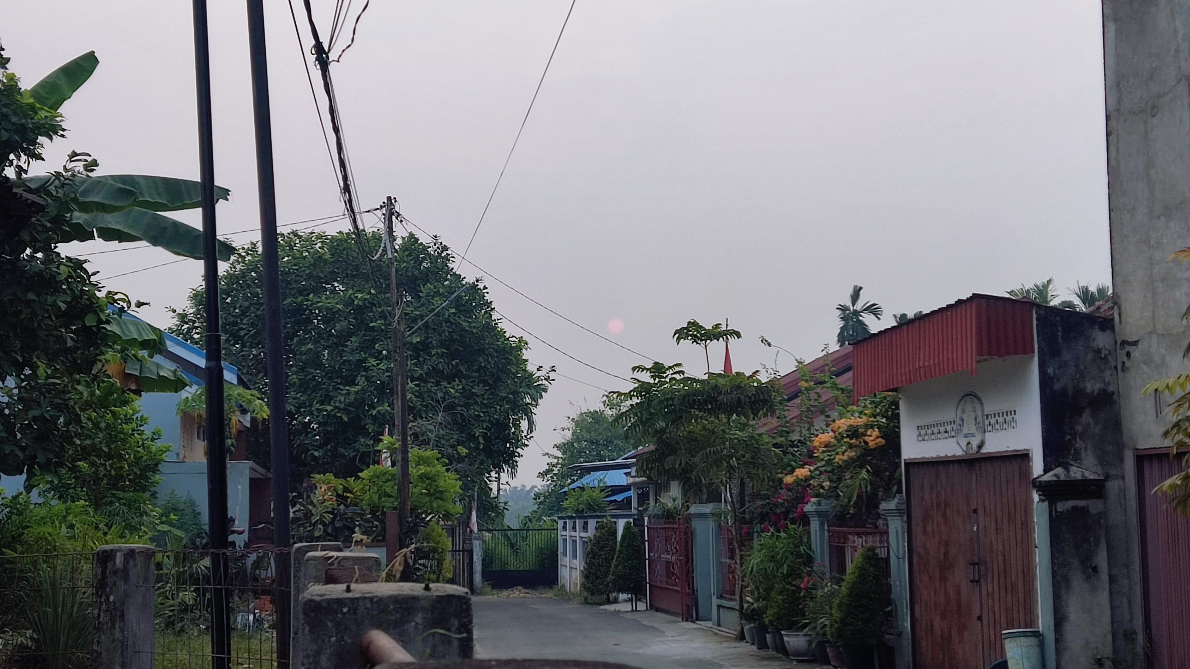 Sunset seen through wildfire haze in Jambi