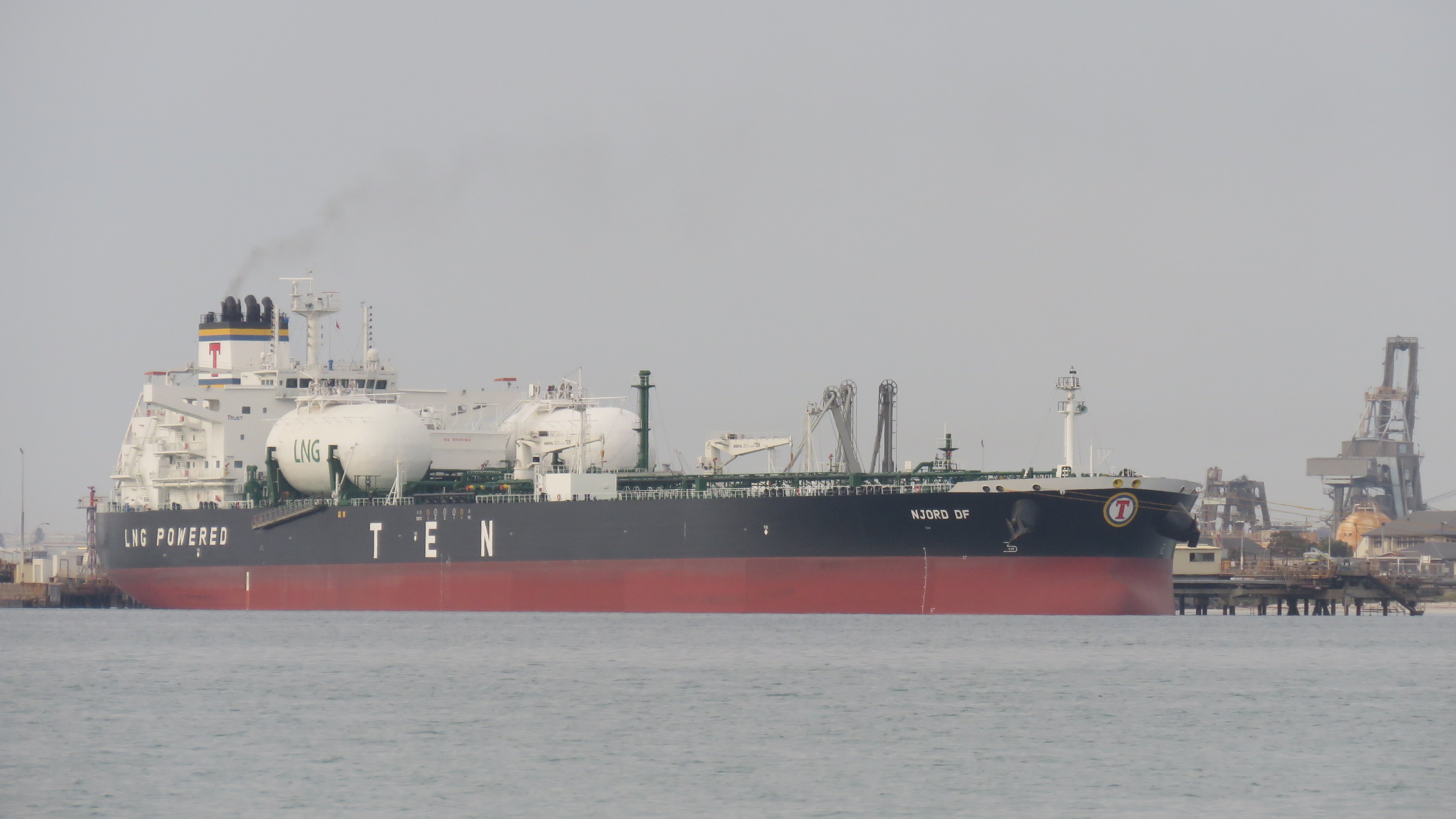 A crude oil tanker at a refinery jetty